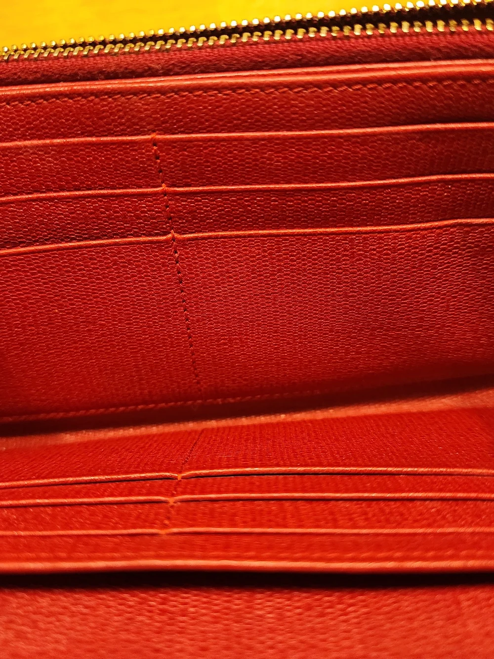 red textured leather Yves Saint Laurent Y-Line wallet gold-tone hardware